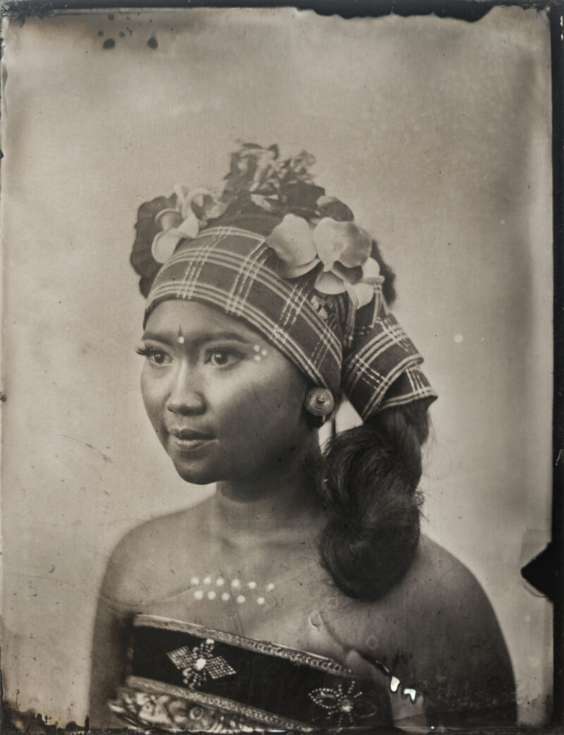 Balinese girl in tenun traditional costume